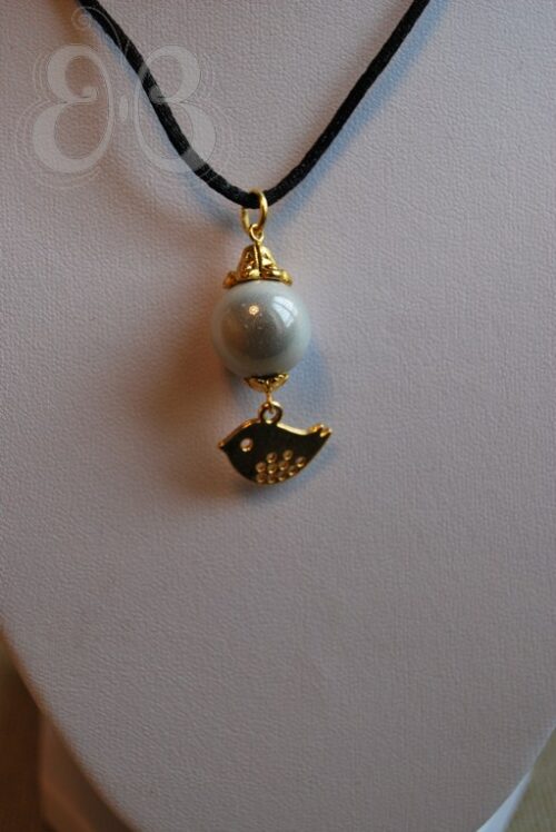 Collier à l'oiseau d'or