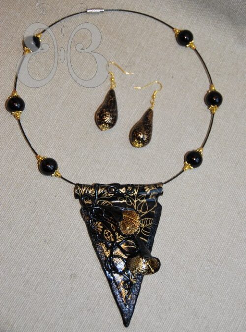 boucles d'oreilles en pâte polymère noir et feuille d'or