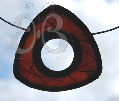 Collier polymère imitation ambre sertie de noir