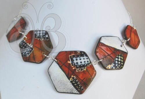 Collier polymère imitation ambre et céramique